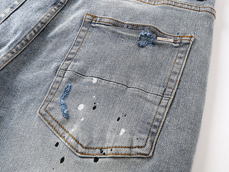 AMIRI Light Blue Distressed Paint Splatter Jeans
